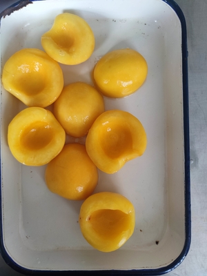 Frutas melocotones amarillos en lata etiqueta privada aceptable