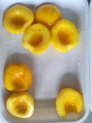 Frutas amarillas enlatadas en jarabe 820g para el proceso de conservación