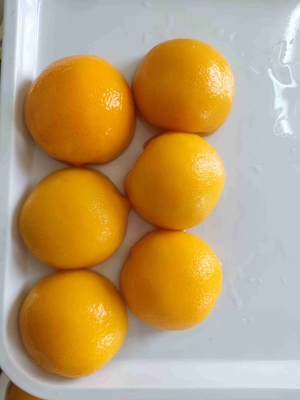 Delicioso melocotón amarillo enlatado para los amantes de la fruta Servido refrigerado o a temperatura ambiente
