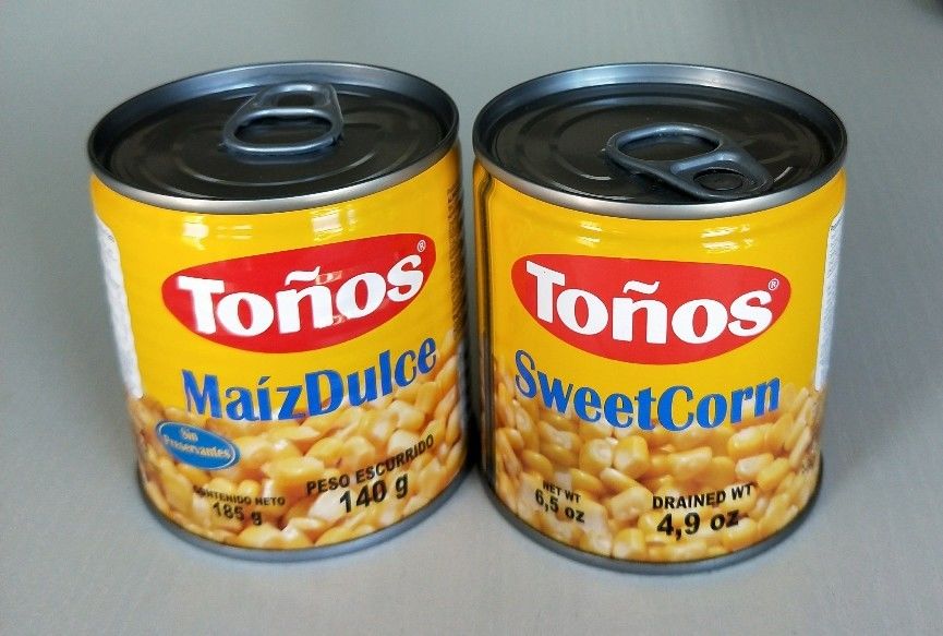 El dulce de la marca de Tonos conservó las latas litográficas de Maiz Dulze 185g del maíz